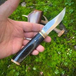 couteau de chasse  d'exception d'artisan / os de mammouth , ivoire de mammouth / lame 80crv2