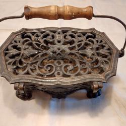 Chaufferette ancienne en fonte