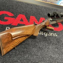 Carabine express Merkel juxtapos&eacute; avec point rouge Aimpoint 34L