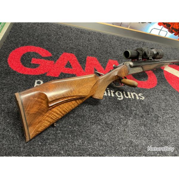 Carabine express Merkel juxtapos� avec point rouge Aimpoint 34L