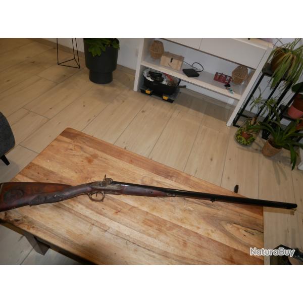 Fusil � percussion avec crosse d�cor�e d'une magnifique t�te de sanglier