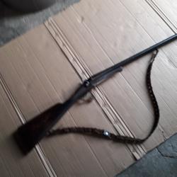 Fusil juxtapos&eacute; &agrave; chien et percussion centrale