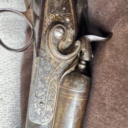 Fusil ancien &agrave; canons juxtapos&eacute;s, calibre 12, finement cisel&eacute;, enregistr&eacute; SIA