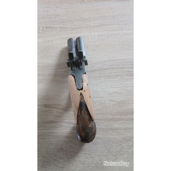 pistolet � capsule double canon