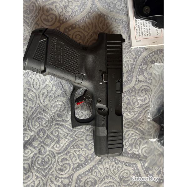 Vends Glock 26 avec holster ceinture, d�tente Timmey et 3 chargeurs. Excellent �tat, malette etc.