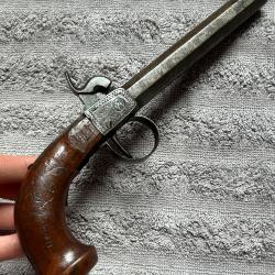Pistolet de coffre &agrave; percussion canon damas