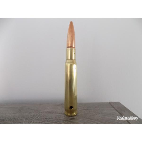 Cartouche calibre 12.7mm neutralis�e par per�age.
