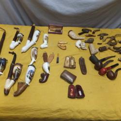 Collection tr&egrave;s importante de pipes, fumes cigarettes.   Et pi&egrave;ces d&eacute;tach&eacute;es