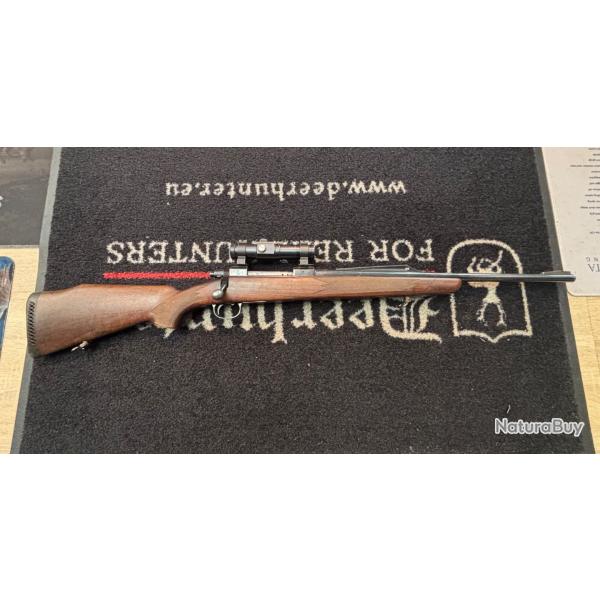 Carabine de chasse a verrou Tikka M 65 cal300win mag a vendre aux ench�res + point rouge