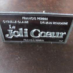 Plaque impression publicitaire film Le joli coeur de 1984