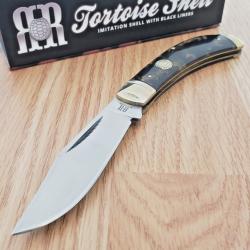 Couteau Rough Rider Bow Trapper Lame Clip Point Acier 440 Manche Imitation Tortue Cran Forc&eacute;