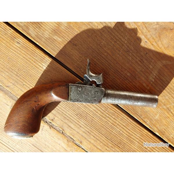 Pistolet percussion coup de poing