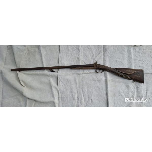 Fusil de chasse debut XIX �me � percussion crosse sculpter