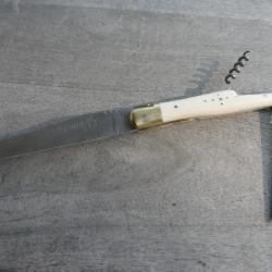 Laguiole "Carte de France". Manche ivoire. 3 pi&egrave;ces:Lame carbone; tire-bouchon 5 spires; poin&ccedil;on.