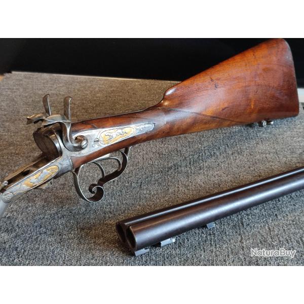 Fusil juxtapos� Li�gois calibre 16 � broche de luxe enti�rement grav� de sc�ne d'animaux et dor�