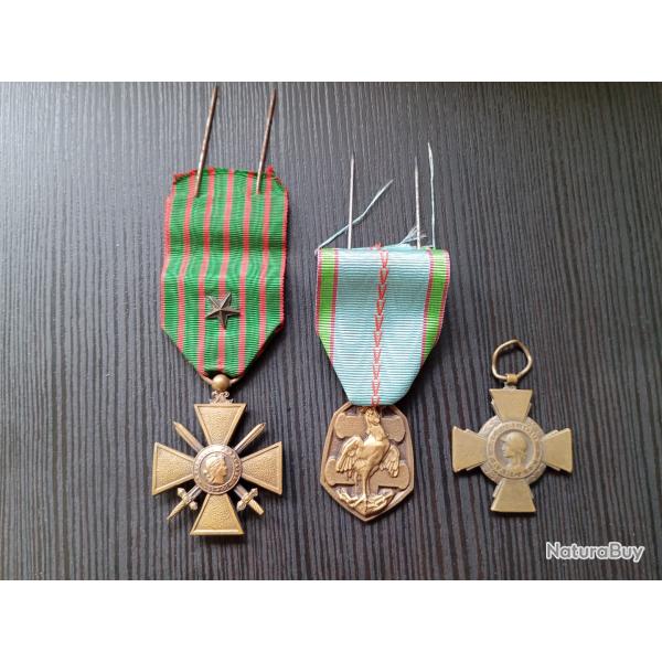 Lot m�dailles: 1 de 1914-1918 avec 1 �toile 1 de 1939-1945 et une croix du combattant