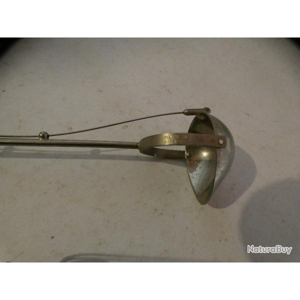 Insolite cuill�re articul�e  � levier avec piston