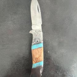 Couteau t&ecirc;te d'aigle grav&eacute;e