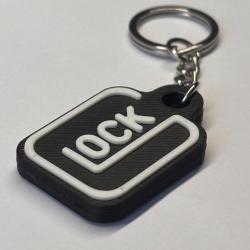 Porte-cl&eacute; plastique style Glock - accessoire original - noir et blanc