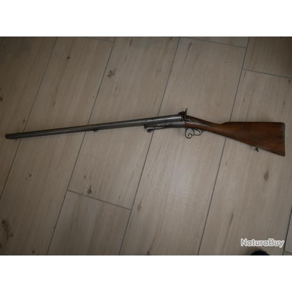 Fusil juxtapos� � broche cal 12 ce qui n'est pas tr�s courant, � restaurer
