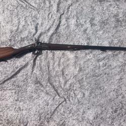 FUSIL JUSTAPOSE A PERCUSSION DE FEMME