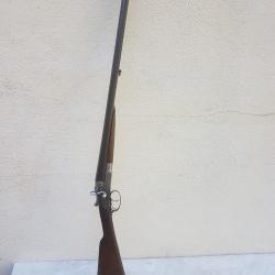 Vds un fusil cal 12 juxtapos&eacute; &agrave; chiens  poudre T en bon &eacute;tat