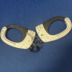 Menottes RIVOLIER double s&eacute;curit&eacute; bouton poussoir