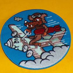 TISSU PATCH : ESCADRILLE DE BOMBARDEMENT AVEC LOUP SUR AVION&nbsp; , DIAMETRE&nbsp;10&nbsp;CM , BON ETAT VOIR PHOTO