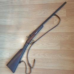 Ancienne carabine de jardin de type Flobert en 9mm FL avec un syst&egrave;me particulier de percussion.