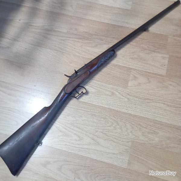 Ancienne carabine de jardin de type Flobert en 9mm FL avec un syst�me particulier de percussion.