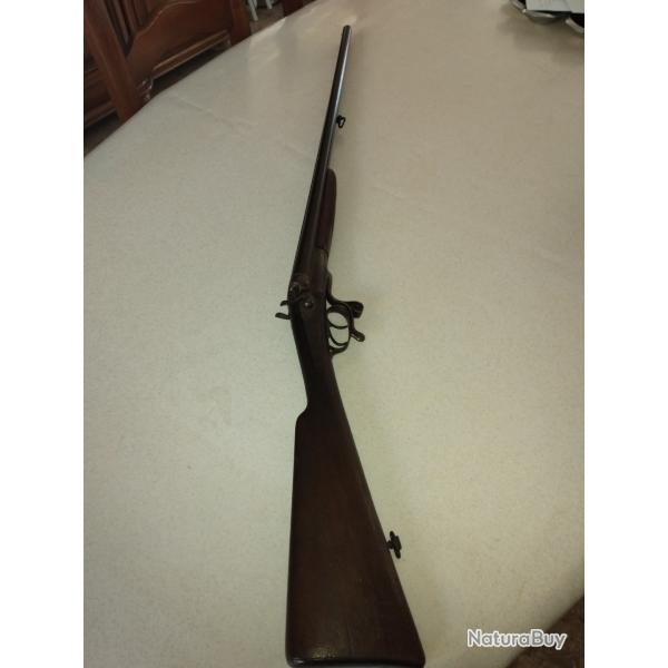 fusil  ancien  juxtapos� a chiens  en calibre 16  categorie  d