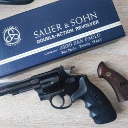 Revolver Sauer&Sohn 38sp de 1982 4" type S&W service sp&eacute;cial hausse r&eacute;glable. Avec poign&eacute;e combat.