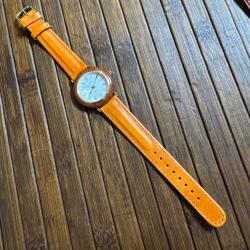 MONTRE C.D.C QUARTZ EN BOIS , ACIER ET CUIR