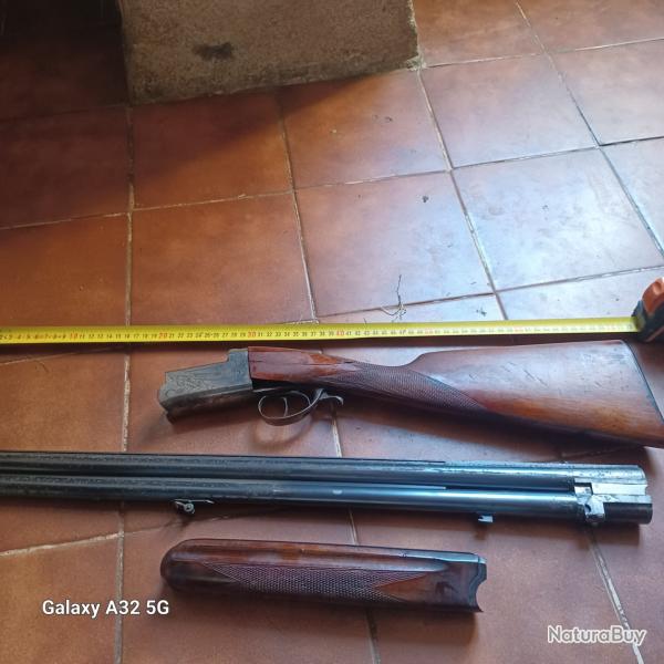 Fusil de chasse Marque super Europe. Avec etui . bois de la crosse un peu ab�m�e mais fonctionne  tb