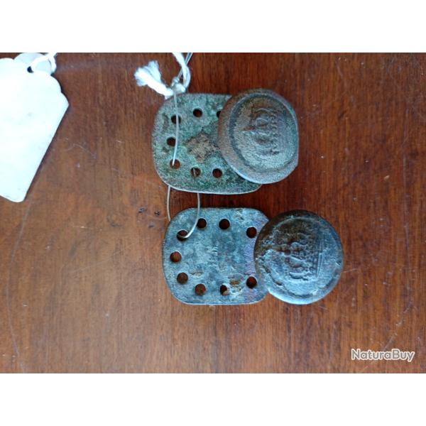 Bouton de suspension de ceinturon