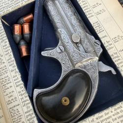 REMINGTON Double Derringer cal. .41rf,  grav&eacute; plaqu&eacute; argent, avec BIBLE CACHETTE et holster.