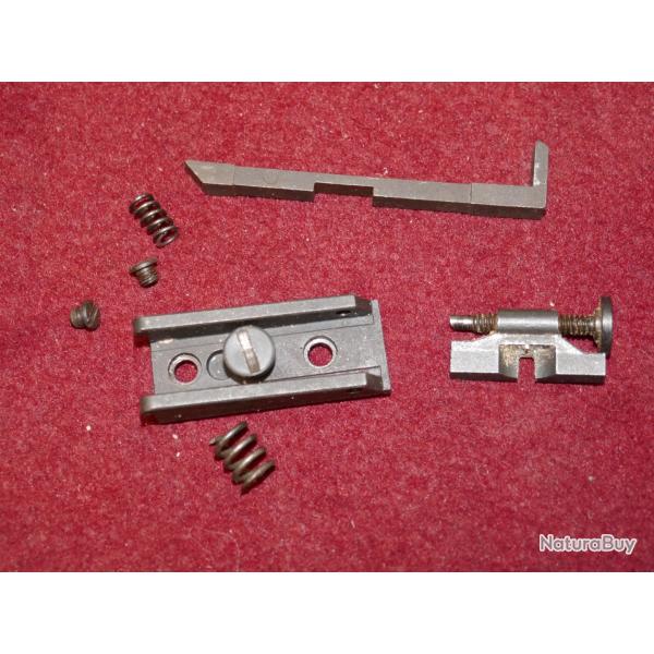 Lot de pi�ces de pistolet CONTENDER dont un extracteur en 22LR