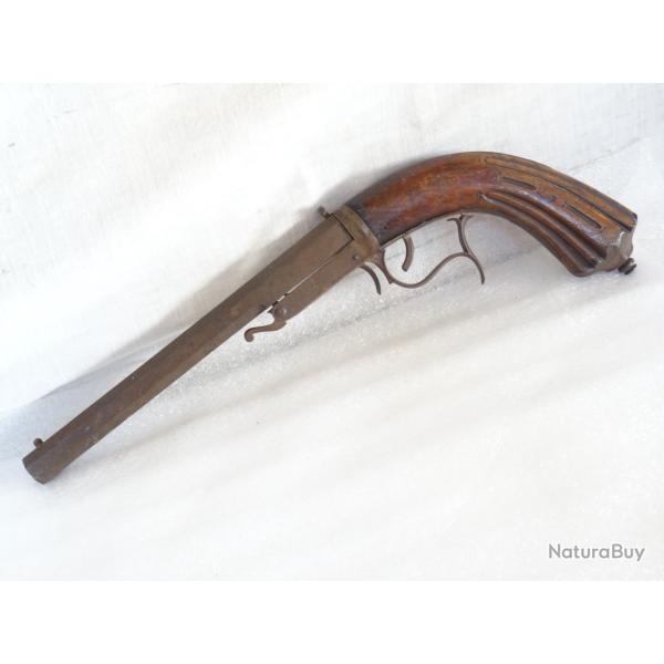584= curieux pistolet de tir a syst�me , canon pivotant , cal 9 mms