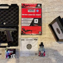 Pack COLT P1911 CO2 SwissArms 4,5 mm - Full m&eacute;tal blowback 1,7 J +mallette+billes+CO2+Porte Cible