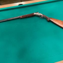 Fusil Rizzini calibre 20 chambre 76 Magnum avec sa valise de transport et sa boite compl&egrave;te de choke