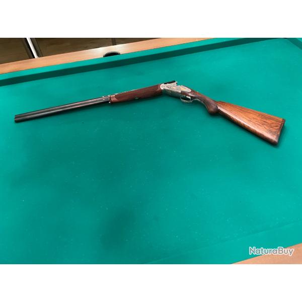 Fusil Rizzini calibre 20 chambre 76 Magnum avec sa valise de transport et sa boite compl�te de choke