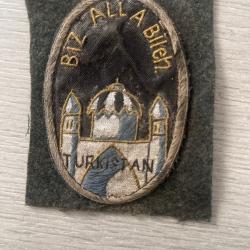 un &eacute;cusson avec un &eacute;difice ww2