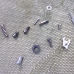 diverses petites pi&egrave;ces  de revolver Mauser K50 "magnum"