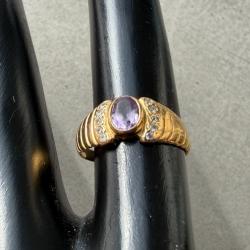 Bague or 18 carats avec pierre violette - taille 49