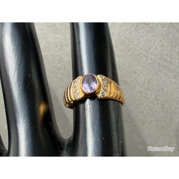 Bague or 18 carats avec pierre violette - taille 49