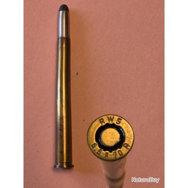 une fine cartouche de 6,5 x  70 R ,RWS  mix ou driling balle demie bind�e en D