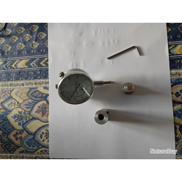 Outil pour contr�ler l �paisseur du bourrelet des cartouches 22 lr