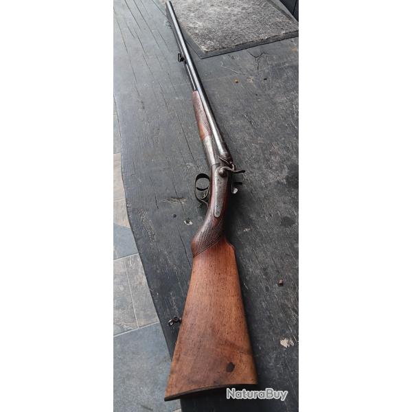Ancien fusil stephanois � chiens ext�rieur percussion centrale cal 12x65