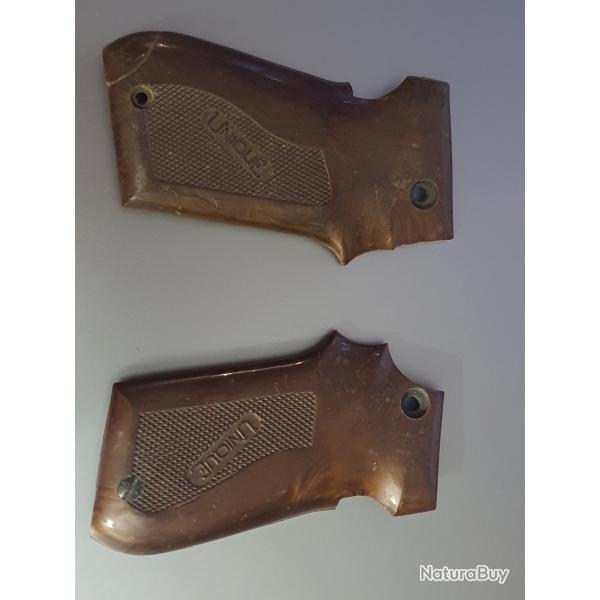 PAIRE PLAQUETTES DE CROSSE PISTOLET UNIQUE � IDENTIFIER