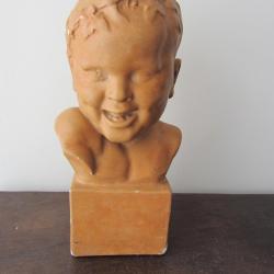 Buste d'enfant en pl&acirc;tre patin&eacute; sign&eacute; F. Guis 1930